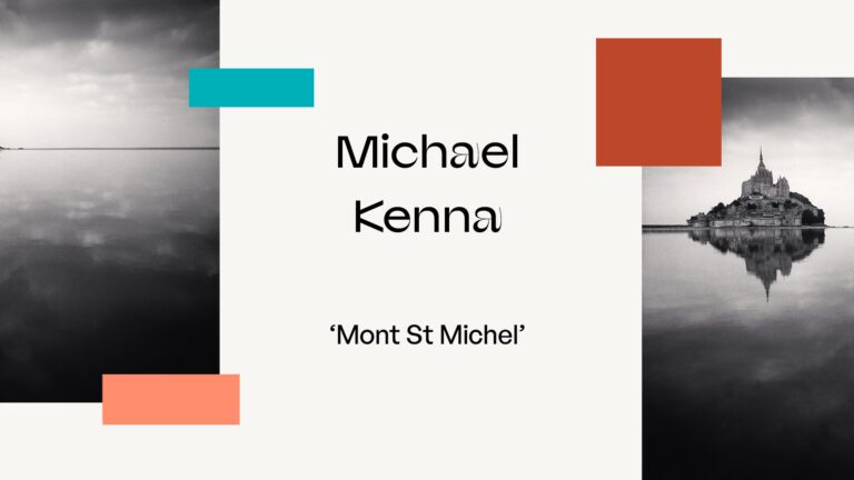 Portada del fotolibro Mont St Michel de Michael Kenna con la silueta oscura de la abadía sobre fondo gris